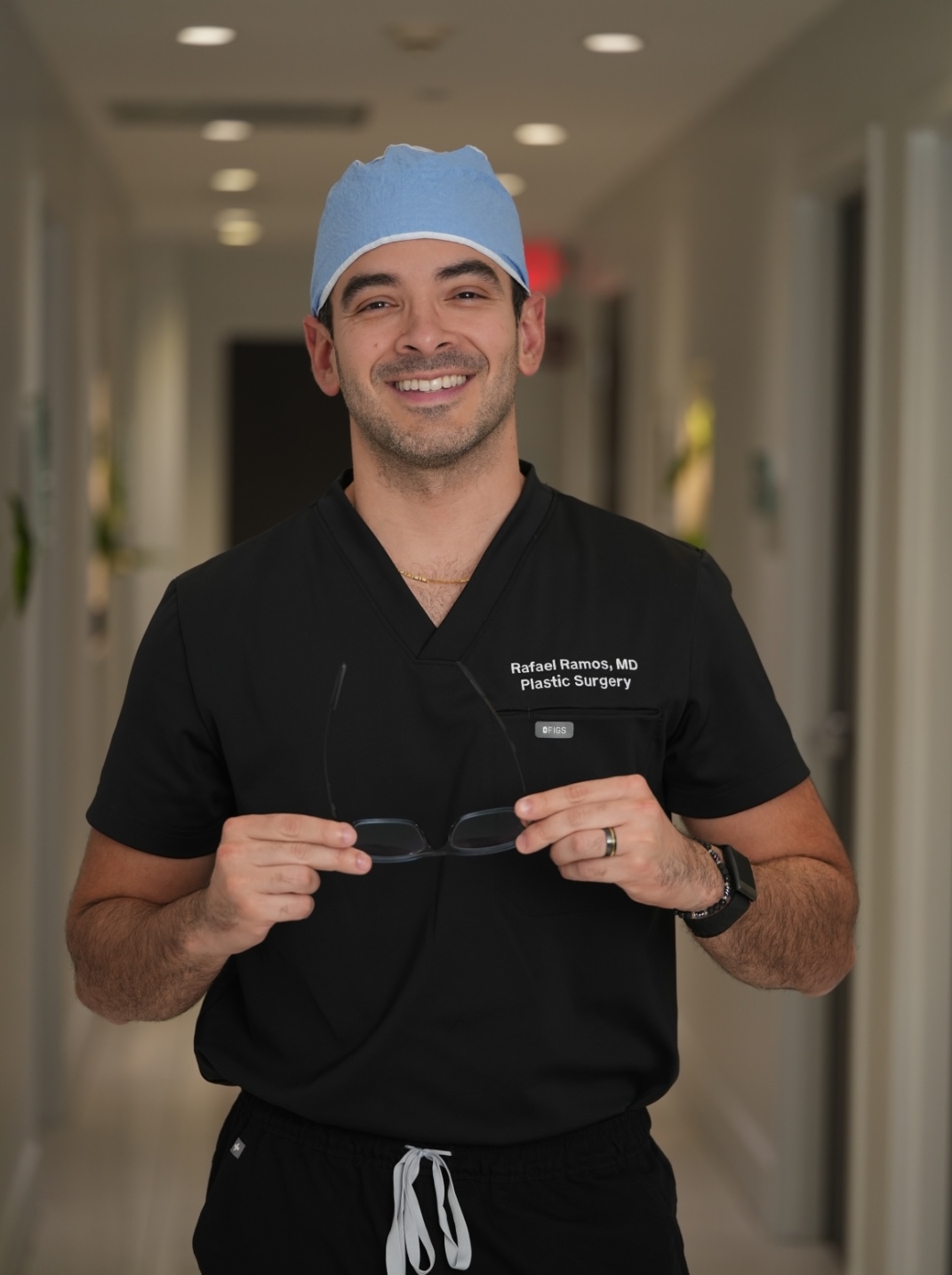 Rafael Ramos, MD, in surgical scrubs at Attain Miami